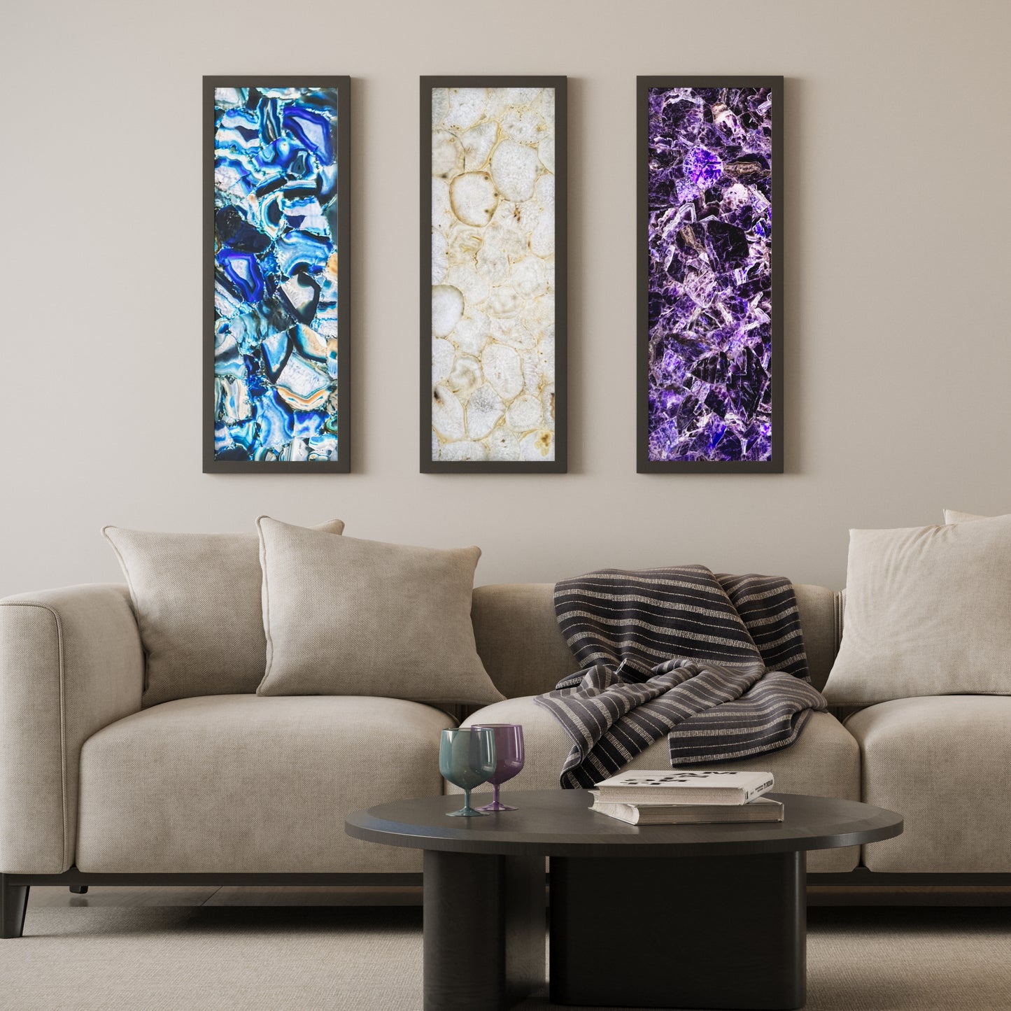 Luxury living room with three framed backlit gemstone panels in Amethyst, Blue Agate, and White Agate, elegantly mounted in a modern interior.
