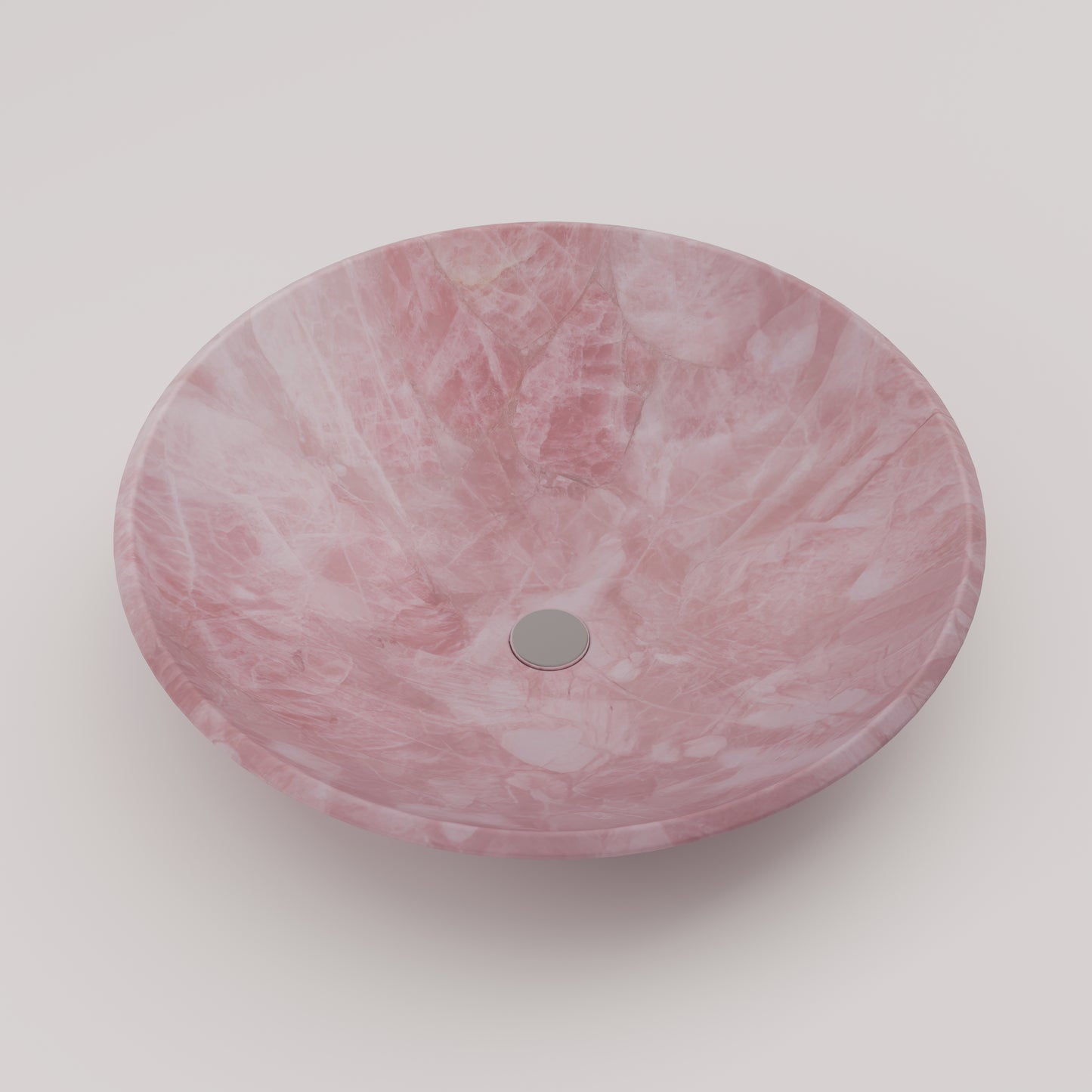 Luxury round sink handcrafted from Pink Quartz semi-precious stone — ideal for high-end vanities and designer bathrooms by Pierre Mason