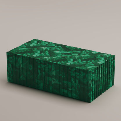 Cannelé Coffee Table crafted from Malachite semi-precious stone, a bold centerpiece and statement piece by Pierre Mason