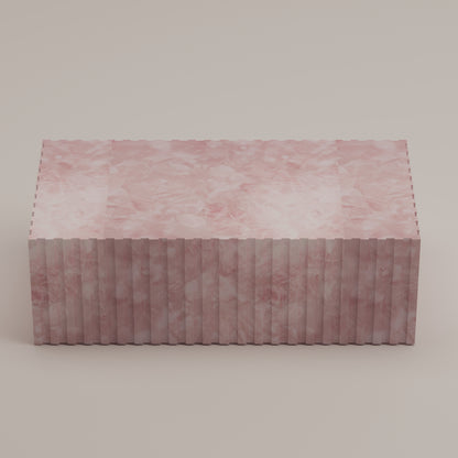 Cannelé Coffee Table crafted from Pink Quartz semi-precious stone, a sculptural centerpiece and functional art piece by Pierre Mason