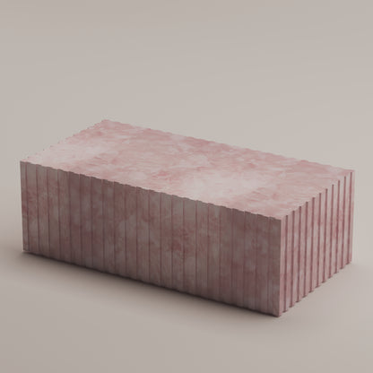 Cannelé Coffee Table crafted from Pink Quartz semi-precious stone, a sculptural centerpiece and functional art piece by Pierre Mason