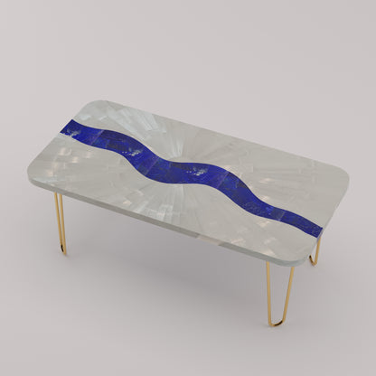 Légère Coffee Table with handcrafted selenite sunburst top and lapis lazuli river inlay with handcrafted brass hairpin legs by Pierre Mason