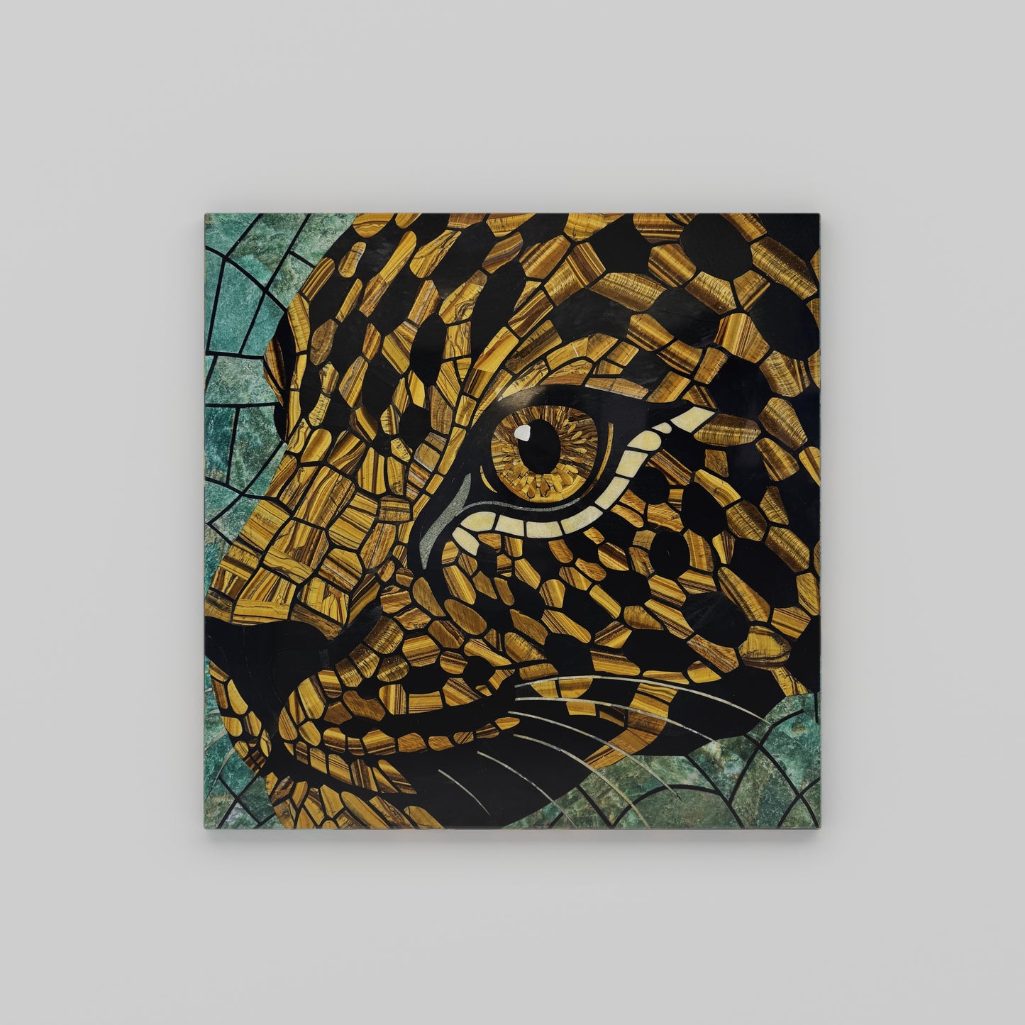 Leopard’s Gaze stone mosaic wall art made from tiger eye, obsidian, and Russian serpentine by Pierre Mason