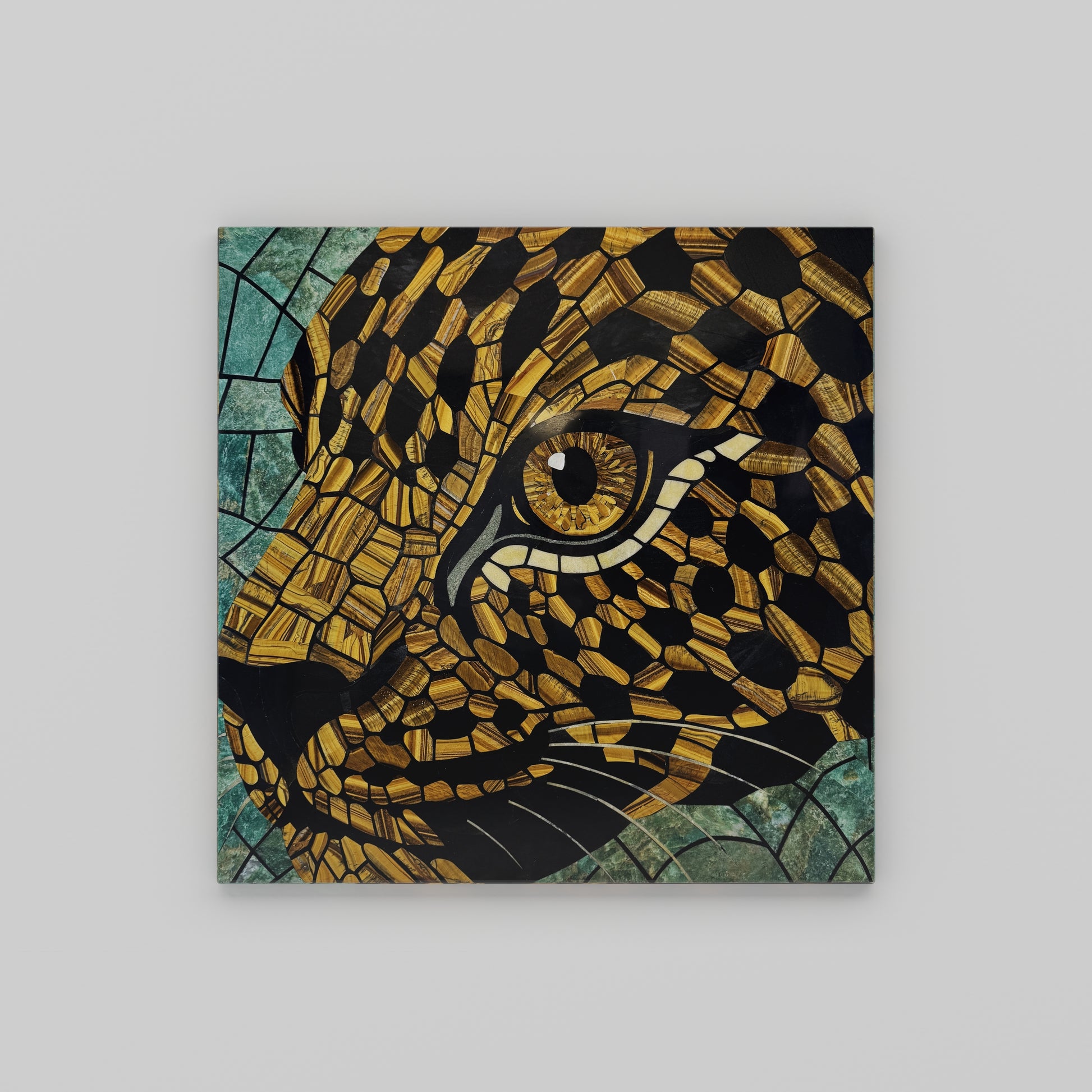 Leopard’s Gaze stone mosaic wall art made from tiger eye, obsidian, and Russian serpentine by Pierre Mason