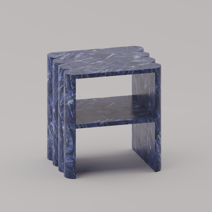 Ondulé Side Table with hand-sculpted scalloped detailing on both sides in sodalite stone by Pierre Mason