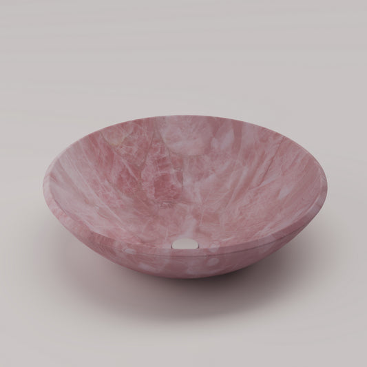 Luxury round sink handcrafted from Pink Quartz semi-precious stone — ideal for high-end vanities and designer bathrooms by Pierre Mason